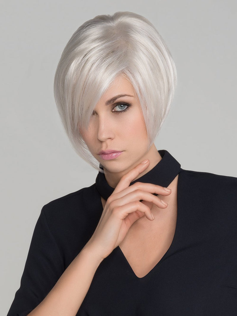 A lightweight asymmetrical short wig with a long fringe that falls perfectly along the face